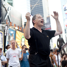 Conductor Kent Tritle in Times Square. (And that's WNYC's John Schaefer in the Saratoga T-shirt.)