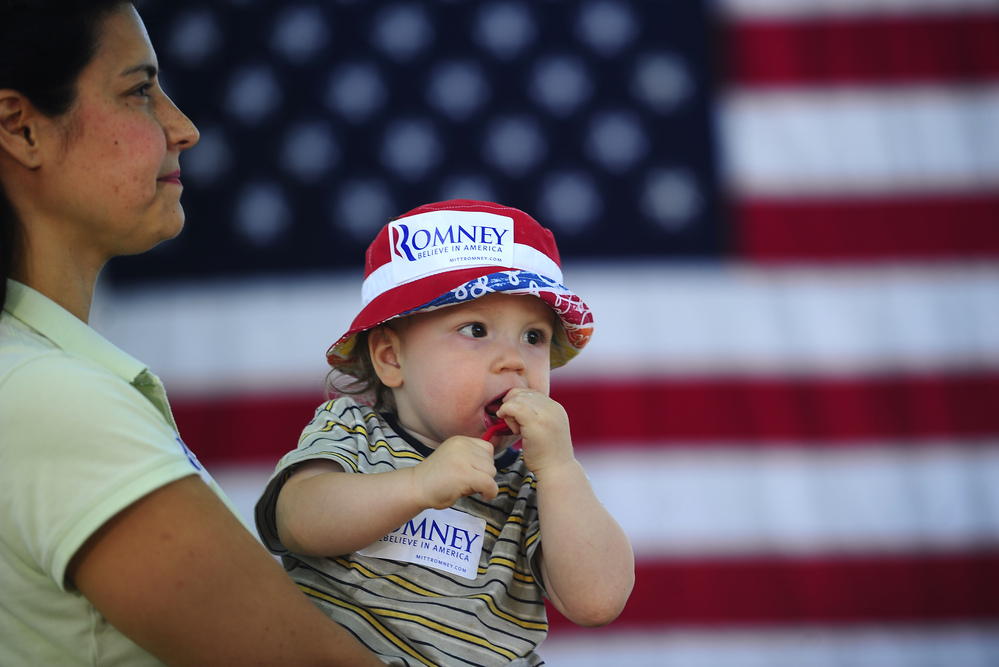 Mitt Romney supporters at a political rally in Milford, New Hampshire.