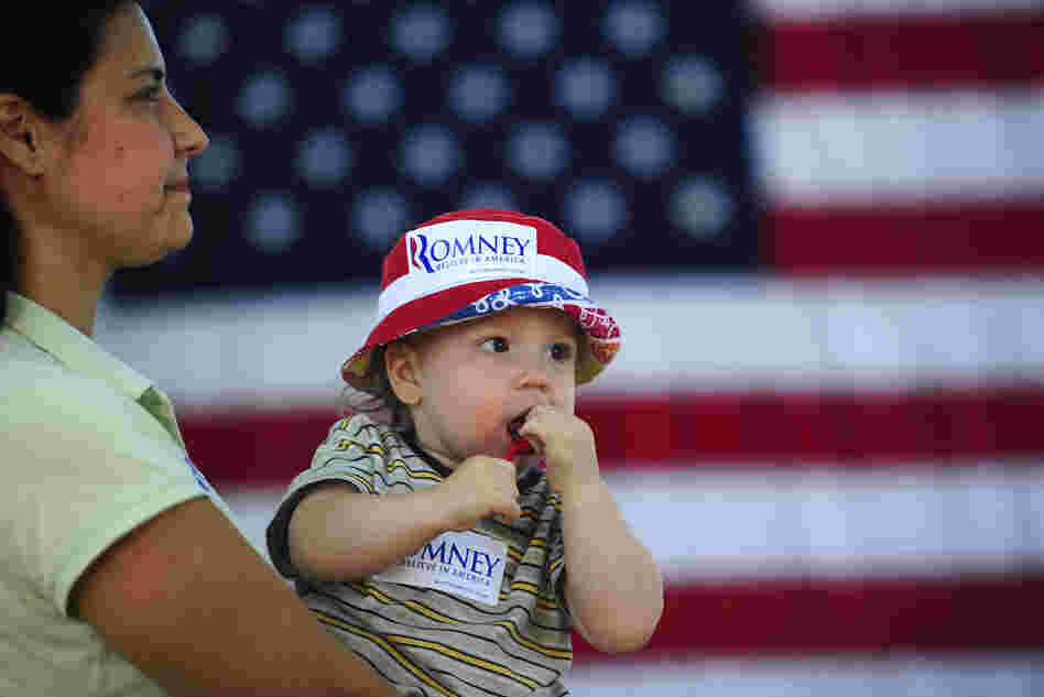 Mitt Romney supporters at a political rally in Milford, New Hampshire.