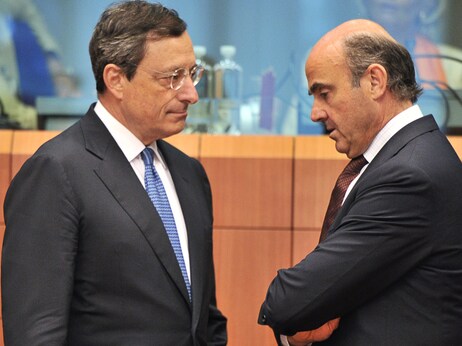 European Central Bank president Mario Draghi, left, speaks with Spanish Finance Minister Luis De Guindos on Monday. The ECB has increased its influence over European countries struggling with debt. European Central Bank president Mario Draghi, left, speaks with Spanish Finance Minister Luis De Guindos on Monday. The ECB has increased its influence over European countries struggling with debt.