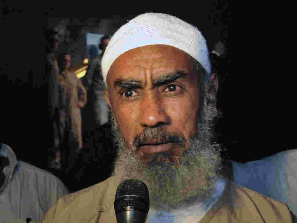 Ibrahim al-Qosi, shown here on July 11 in Khartoum, Sudan, was released from Guantanamo Bay prison this week after spending a decade there. He was Osama bin Laden's former driver, and he pleaded guilty to charges of conspiracy with al-Qaida and supporting terrorism. There are now 168 prisoners remaining at Guantanamo.