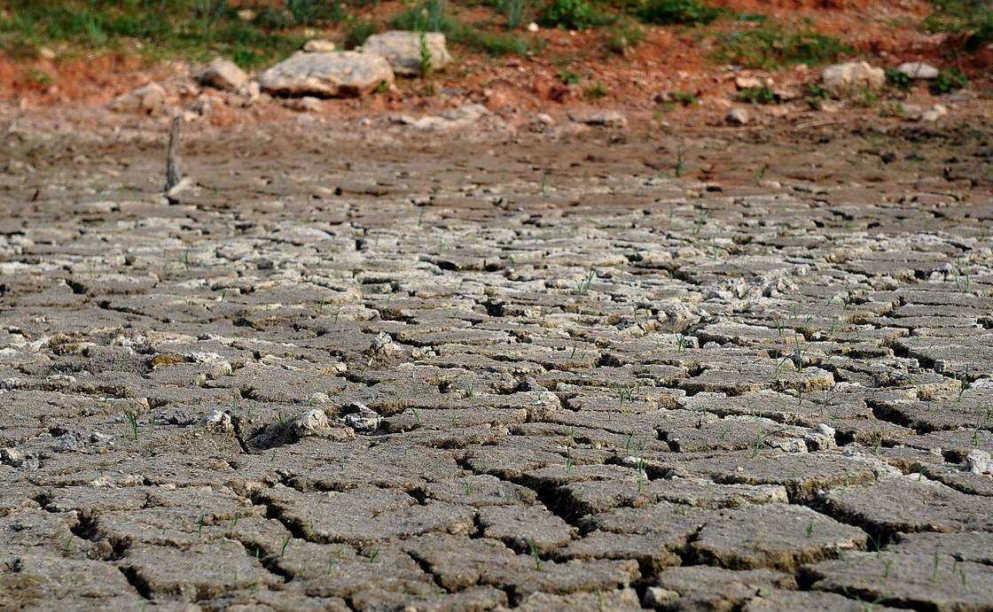 In this Aug. 2, 2011 file photo, the bottom of the pond at the Gene Howe Wildlife Management Area is nearly dried up in Amarillo, Texas. A devastating drought across Texas turned rivers into sand, creeks into mud, springs into mere trickles and lakes into large puddles.
