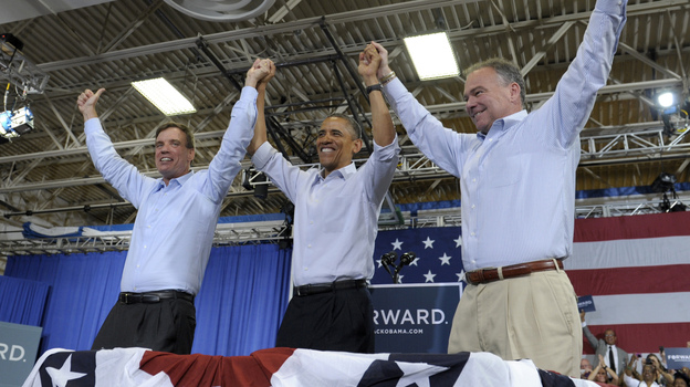 President Obama clasps hands with Sen. Mark Warner (left), D-Va., and Democratic Senate candidate Tim Kaine during a campaign stop Friday in Virginia Beach, Va.