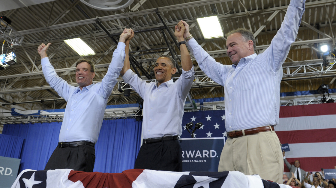 President Obama clasps hands with Sen. Mark Warner (left), D-Va., and Democratic Senate candidate Tim Kaine during a campaign stop Friday in Virginia Beach, Va.