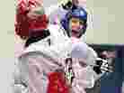 Olympian Diana Lopez (in blue) — not to be confused with the author Diana Lopez — competes in the 2012 Taekwondo Olympic Trials.
