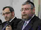 Rabbi Pinchas Goldschmidt, right, president of the Conference of European Rabbis, gestures next to Rabbi Avichai Appel, left, a board member of the Orthodox Rabbinical Conference of Germany, during a news conference in Berlin, Germany on Thursday.