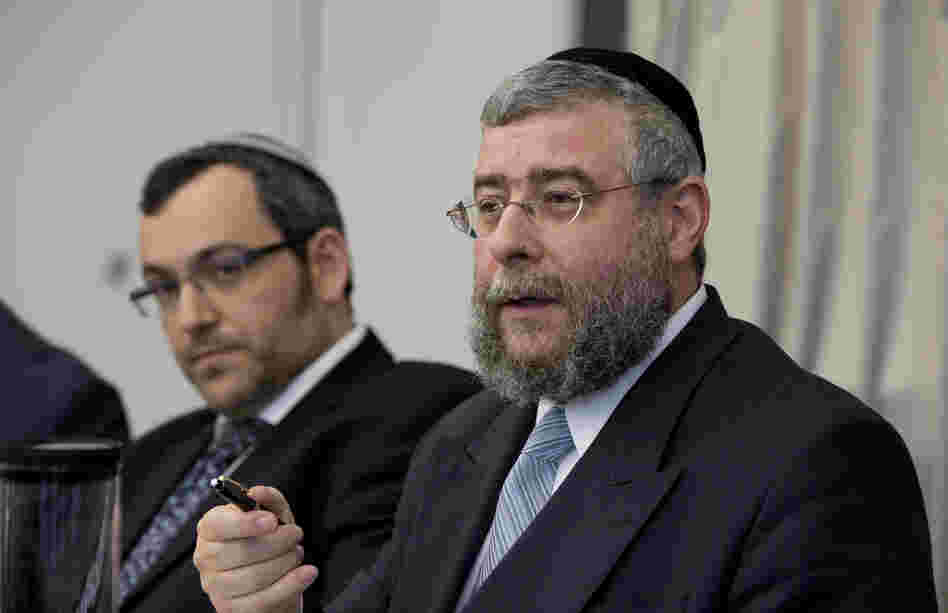 Rabbi Pinchas Goldschmidt, right, president of the Conference of European Rabbis, gestures next to Rabbi Avichai Appel, left, a board member of the Orthodox Rabbinical Conference of Germany, during a news conference in Berlin, Germany on Thursday.