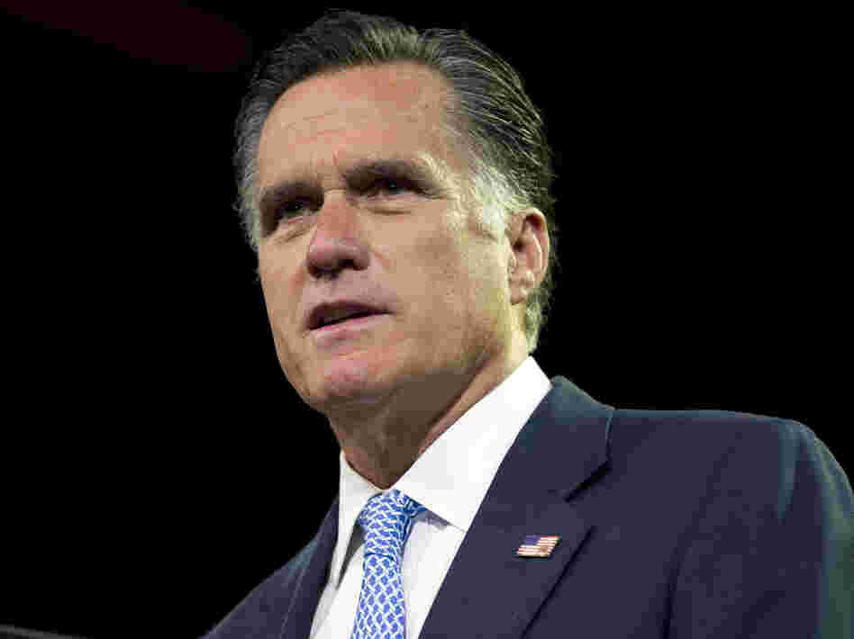 Republican presidential candidate and former Massachusetts Gov. Mitt Romney pauses during a speech to the NAACP annual convention on Wednesday in Houston.