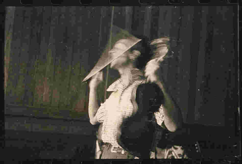 Woody Guthrie performs fiddle tricks at the Music Inn, a carriage house and retreat for New York City intellectuals in Lenox, Mass.
