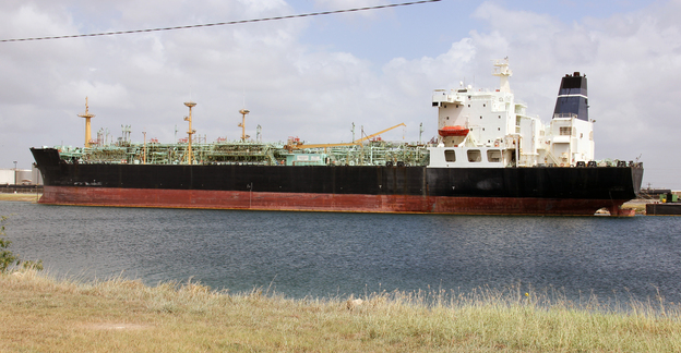 A tanker ship waits to be recycled. Even ships that appear to be in good working condition are valuable as scrap metal.