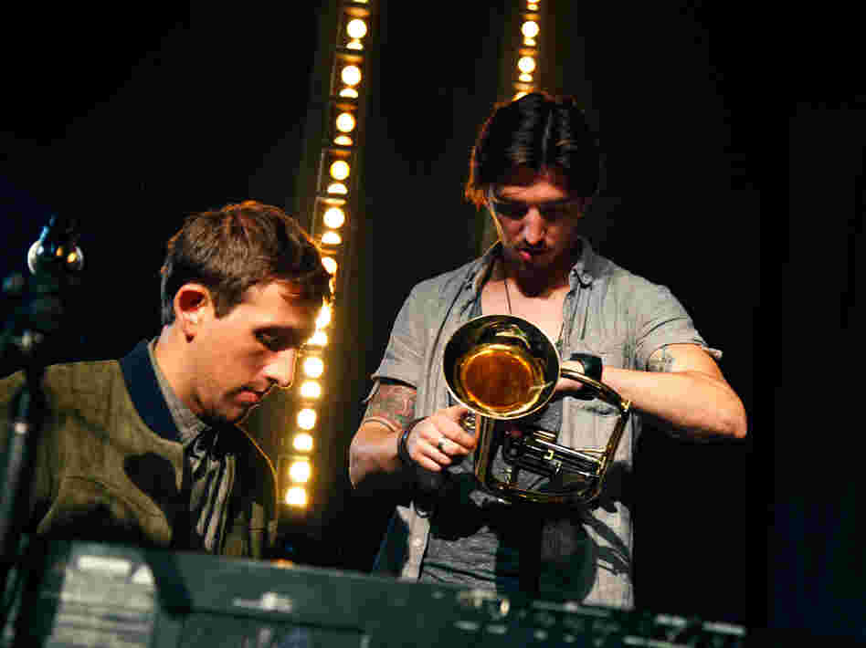 Guitar tech Shane Timm (right) and fun.'s keyboard player Andrew Dost on stage in Brooklyn.