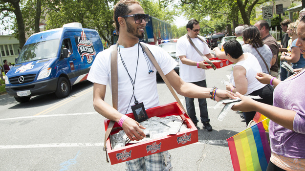 Young activists distribute condoms at an AIDS awareness event in Ashbury Park, N.J.