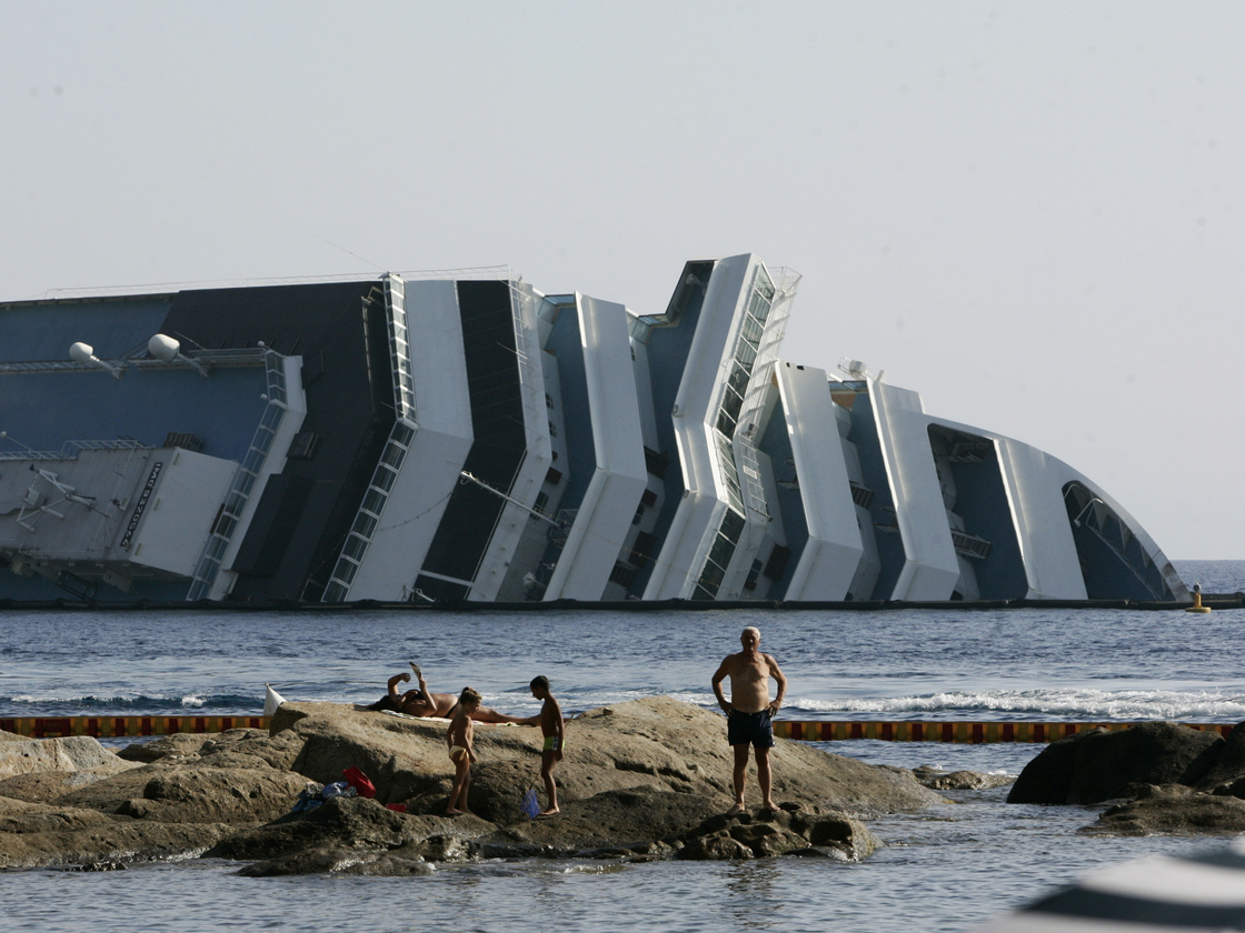 Work has begun to remove the tons of rocky reef embedded into the Concordia cruise ship's hull, off Giglio Island in Italy. The plan is to eventually tow the wreck away from the island in one piece.