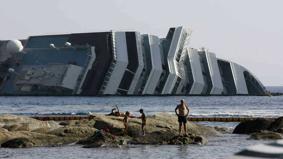 Work has begun to remove the tons of rocky reef embedded into the Concordia cruise ship's hull, off Giglio Island in Italy. The plan is to eventually tow the wreck away from the island in one piece.