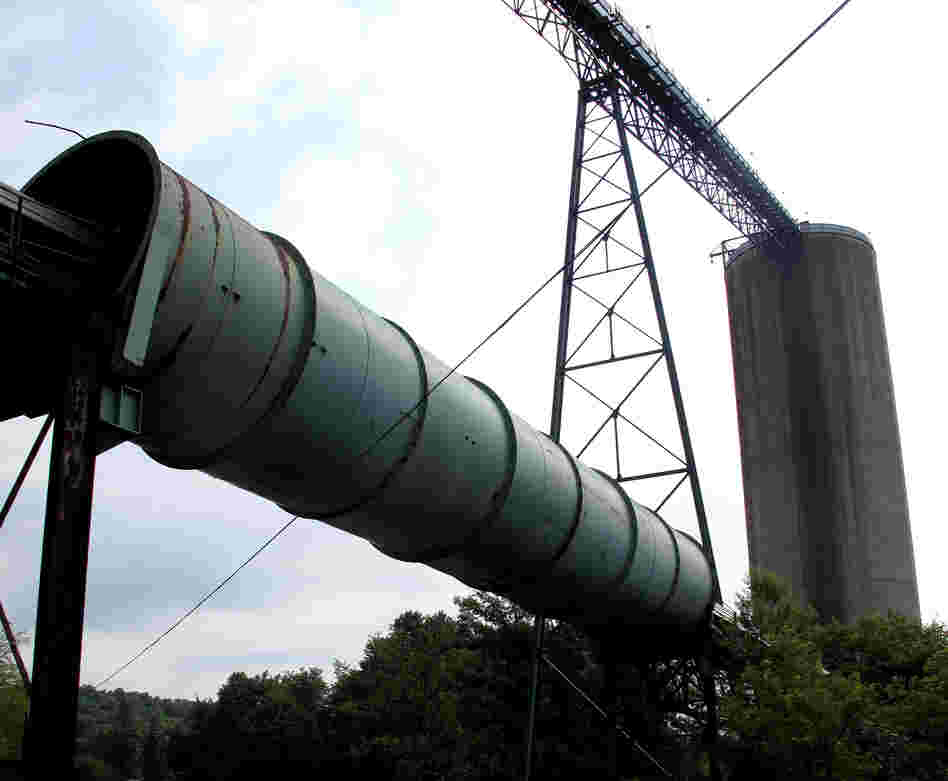 Equipment for transporting and housing coal sits idle in Cowen, W.Va. Since the natural gas boom, several mines in Webster County have either slowed or shut down operation, laying off hundreds of workers.