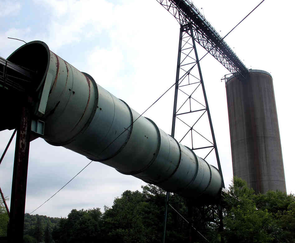 Equipment for transporting and housing coal sits idle in Cowen, W.Va. Since the natural gas boom, several mines in Webster County have either slowed or shut down operation, laying off hundreds of workers.