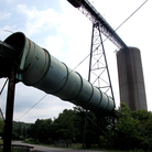 Equipment for transporting and housing coal sits idle in Cowen, W.Va. Since the natural gas boom, several mines in Webster County have either slowed or shut down operation, laying off hundreds of workers.