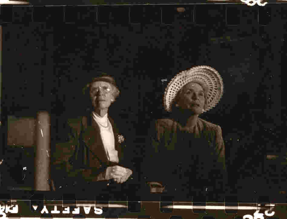 Local women watch the concert. 