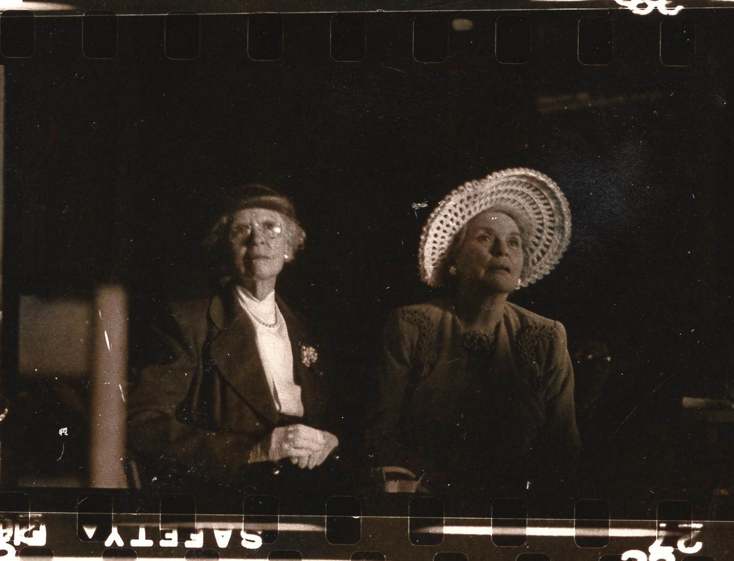  Local women watch the concert. 
