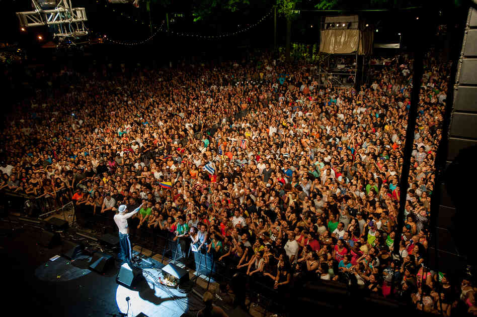 More than 7,000 fans packed the Prospect Park Bandshell to hear the Puerto Rican rap duo Calle 13. Organizers estimated that just as many people were turned away after the venue reached capacity.