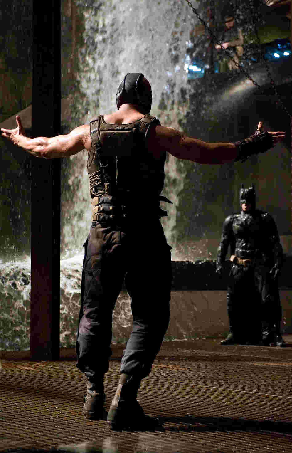 Tom Hardy as Bane and Christian Bale as Batman in The Dark Knight Rises.