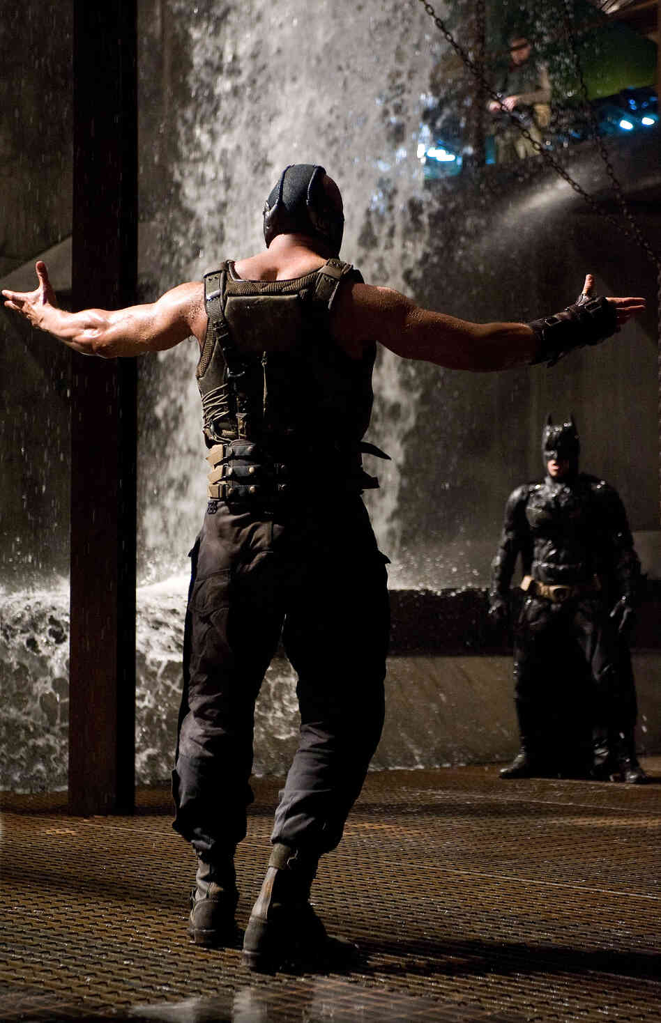 Tom Hardy as Bane and Christian Bale as Batman in The Dark Knight Rises.