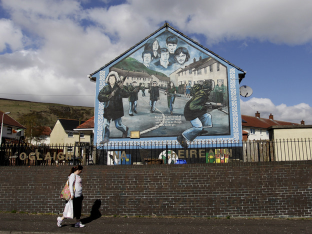 Irish Republican Army murals still loom over streets in West Belfast, where Jean McConville lived until she disappeared in 1972.