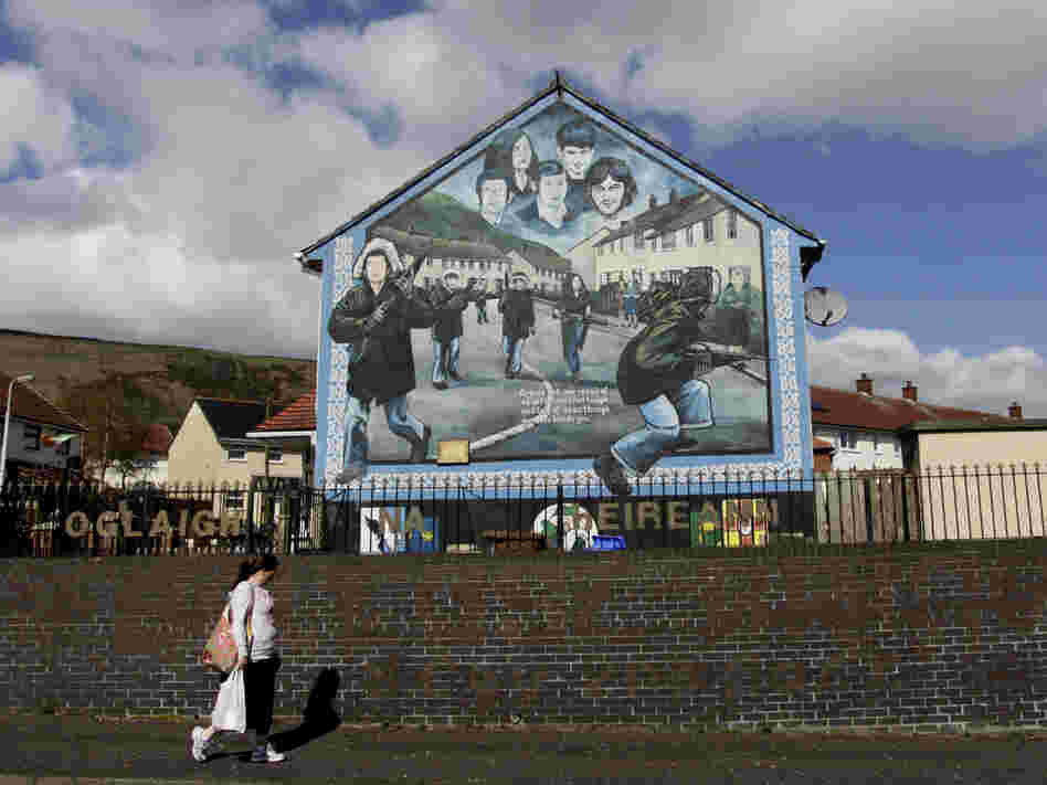 Irish Republican Army murals still loom over streets in West Belfast, where Jean McConville lived until she disappeared in 1972.