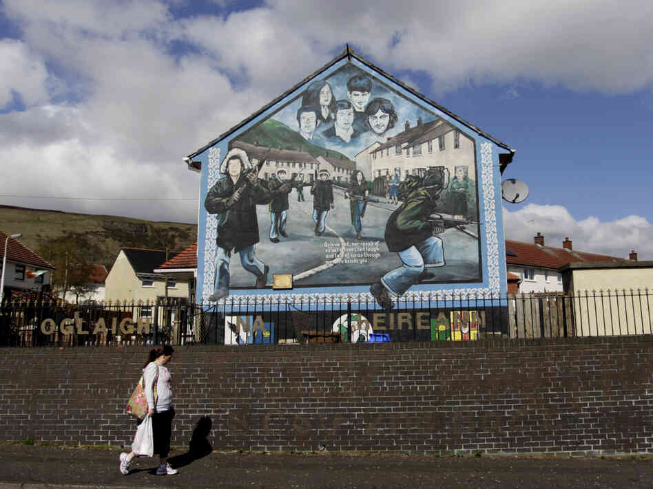 Irish Republican Army murals still loom over streets in West Belfast, where Jean McConville lived until she disappeared in 1972.