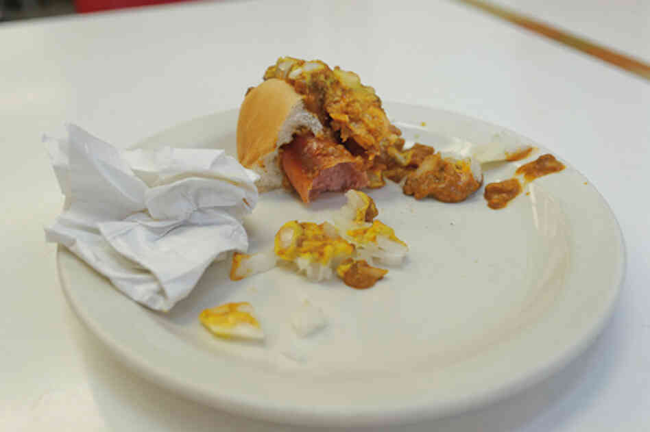 There are several key ingredients that define a Detroit Coney: A steamed bun, a natural-casing hot dog (usually a blend of beef and pork), a beanless chili topping, chopped onions and mustard. Forks are optional. Napkins? Mandatory.