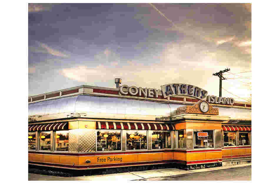 Athens Coney Island  is on Woodward Avenue, which boasted the first mile of paved concrete roads in the United States; today it is home to about a dozen Coney Island restaurants.