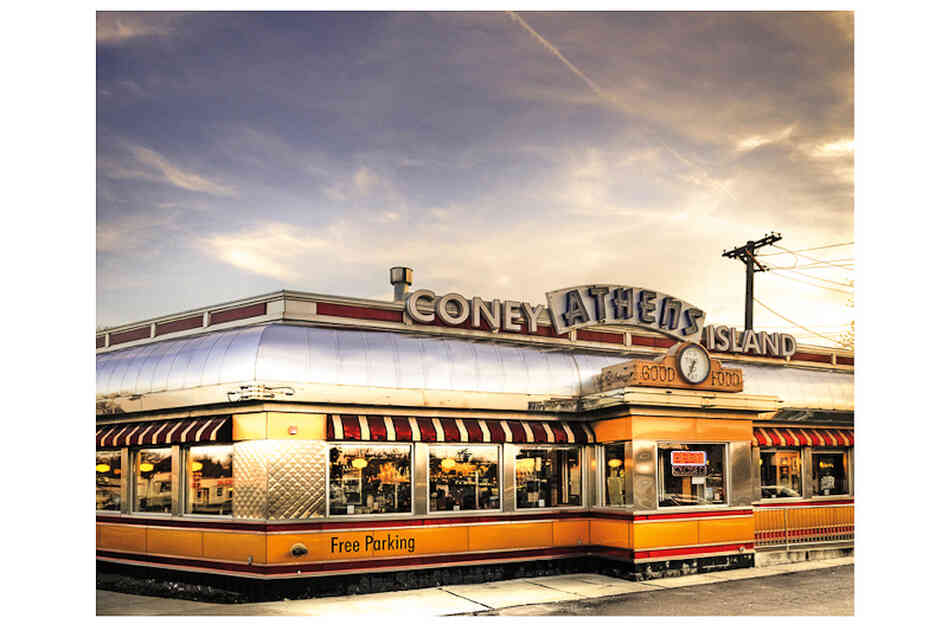 Athens Coney Island  is on Woodward Avenue, which boasted the first mile of paved concrete roads in the United States; today it is home to about a dozen Coney Island restaurants.