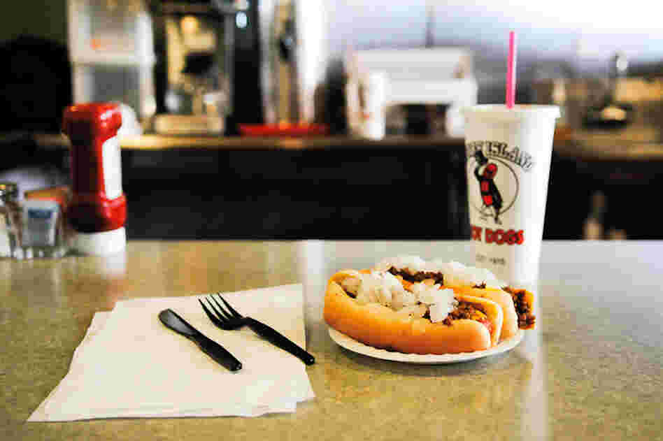 A view of the counter at the Coney Island Lunch in Kalamazoo, founded in 1915 by Greek immigrant Gus Marinos. When eating a Coney, don't grab for that ketchup — "you could get thrown out for that," warns Joe Grimm. 