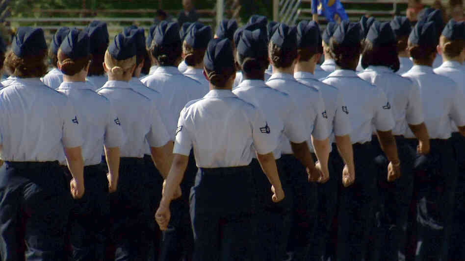 In this June 22 image made from video, female airmen march during graduation at Lackland Air Force Base in San Antonio. A widening sex scandal has rocked Lackland, one of the nation's busiest military training centers. A dozen instructors are being investigated for allegations ranging from abuse to rape. In this June 22 image made from video, female airmen march during graduation at Lackland Air Force Base in San Antonio. A widening sex scandal has rocked Lackland, one of the nation's busiest military training centers. A dozen instructors are being investigated for allegations ranging from abuse to rape.