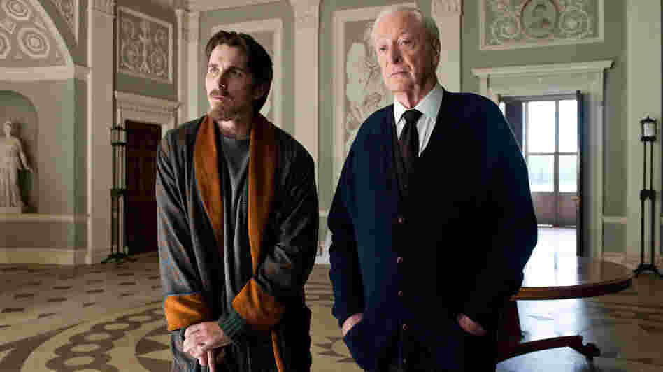 The Dark Knight Rises begins eight years after The Dark Knight, with Bruce Wayne (Christian Bale) living a reclusive life at his mansion alongside Alfred (Michael Caine). The movie is the finale of Christopher Nolan's Batman trilogy. The Dark Knight Rises begins eight years after The Dark Knight, with Bruce Wayne (Christian Bale) living a reclusive life at his mansion alongside Alfred (Michael Caine). The movie is the finale of Christopher Nolan's Batman trilogy.