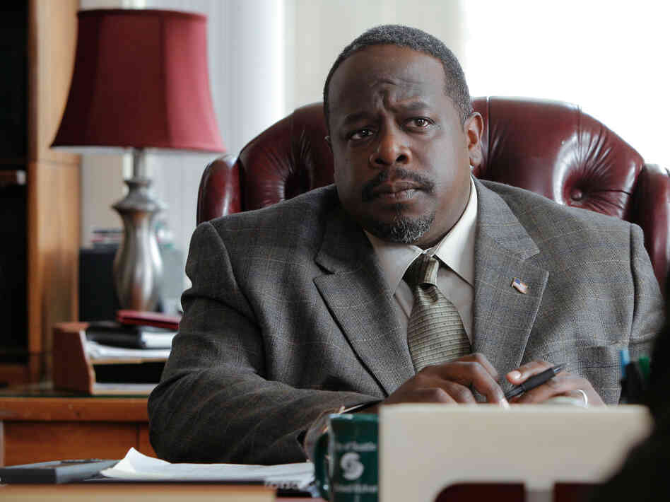 Richard McIver (Cedric the Entertainer) is Cogswell's election opponent, portrayed as the advocate for an undesirable status quo.