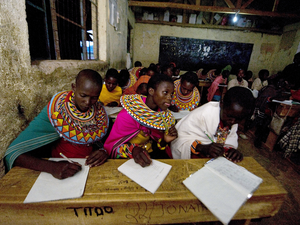 Kenya's attempt at universal education faces multiple challenges. In many rural areas, families want their kids to work during the day. At this school in central Kenya, Samburu kids who herd the family livestock are now taking classes in the evening.