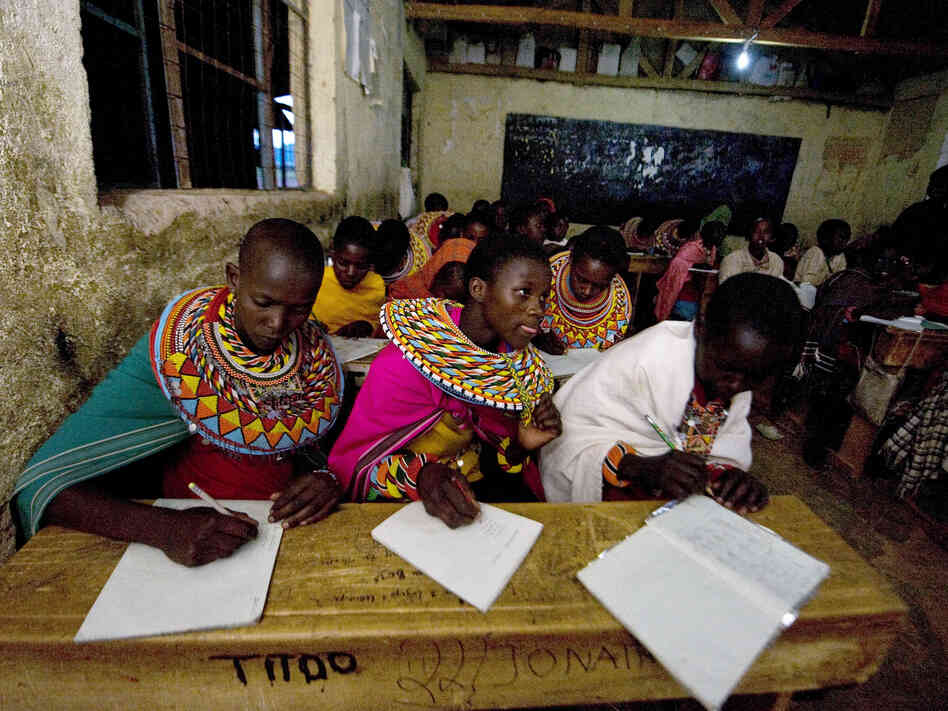 Kenya's attempt at universal education faces multiple challenges. In many rural areas, families want their kids to work during the day. At this school in central Kenya, Samburu kids who herd the family livestock are now taking classes in the evening.