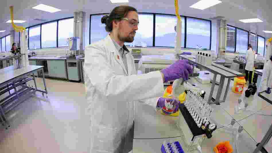An analyst works in the Olympic anti-doping laboratory in January.  The lab in Harlow, England will test 5,000 of the 10,490 athletes' samples from the London 2012 Games.
