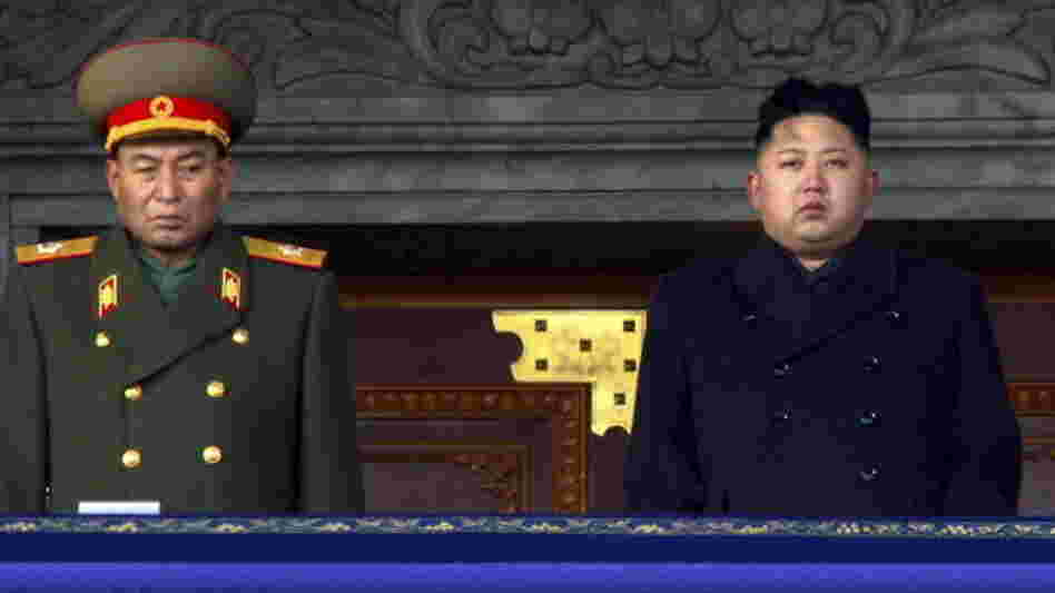 Dec. 29, 2011: new North Korean leader Kim Jong Un, right, and Vice Marshal Ri Yong Ho at a national memorial service for Kim's father, Kim Jong Il. Reports from North Korea say the military leader has been removed from his post.