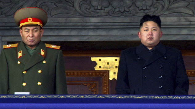 Dec. 29, 2011: new North Korean leader Kim Jong Un, right, and Vice Marshal Ri Yong Ho at a national memorial service for Kim's father, Kim Jong Il. Reports from North Korea say the military leader has been removed from his post.