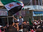 Syria's ongoing fighting is increasingly a sectarian conflict with the majority Sunni Muslims facing off against the Alawites who make up most of the country's ruling elite. Here, government opponents rally in the northern town of Mareh on June 29. Syria's ongoing fighting is increasingly a sectarian conflict with the majority Sunni Muslims facing off against the Alawites who make up most of the country's ruling elite. Here, government opponents rally in the northern town of Mareh on June 29.