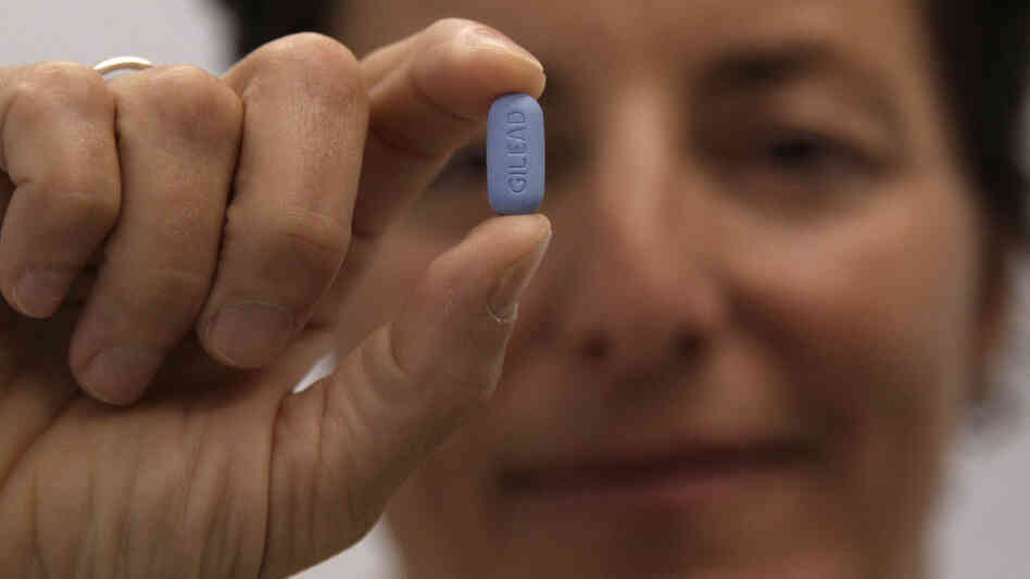 Dr. Lisa Sterman holds up a Truvada pill at her office in San Francisco in May. Even before the Food and Drug Administration's approval, Sterman had prescribed Truvada for about a dozen patients at high risk for developing AIDS. Dr. Lisa Sterman holds up a Truvada pill at her office in San Francisco in May. Even before the Food and Drug Administration's approval, Sterman had prescribed Truvada for about a dozen patients at high risk for developing AIDS.