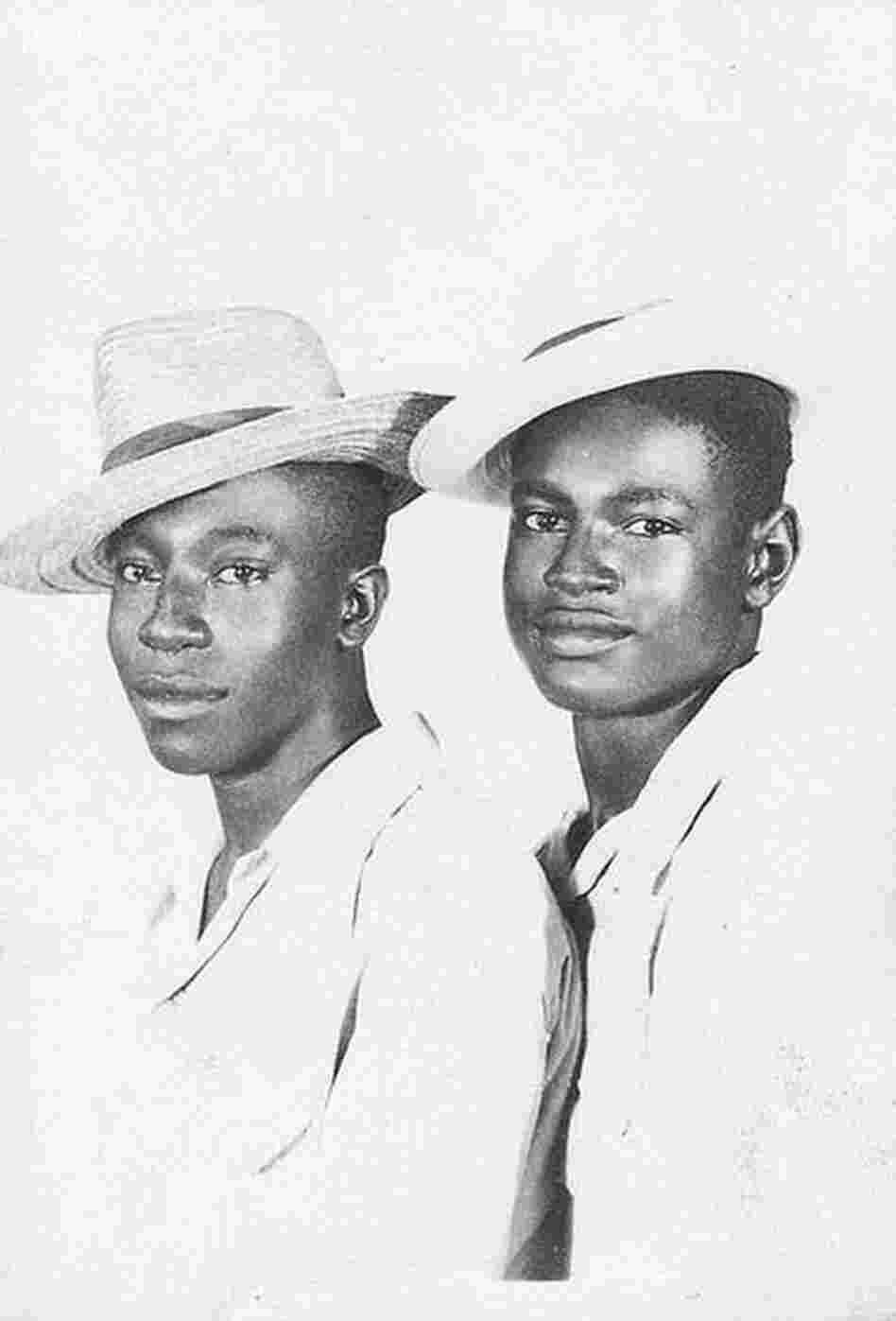 Photographs from "Hidden in the Open," a Flickr collection exploring the idea of African-American male couples.