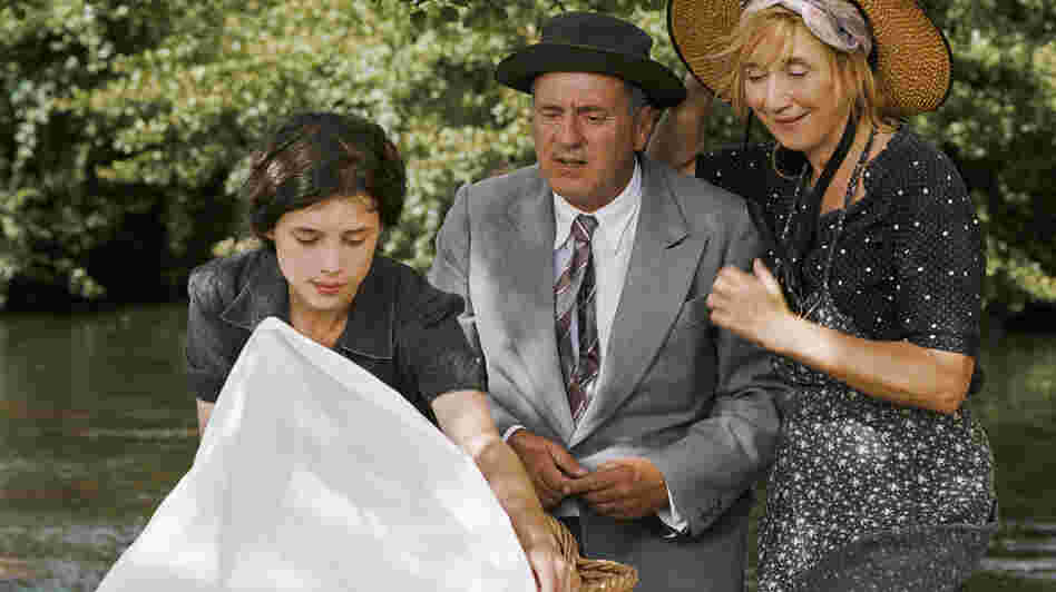 Pascale (Daniel Auteuil) with his sister Nathalie (Marie-Anne Chazel, right) and daughter Patricia (Astrid Berges-Frisbey), who, to his dismay, becomes pregnant in The Well-Digger's Daughter. The film is a remake of Marcel Pagnol's 1940 movie. Pascale (Daniel Auteuil) with his sister Nathalie (Marie-Anne Chazel, right) and daughter Patricia (Astrid Berges-Frisbey), who, to his dismay, becomes pregnant in The Well-Digger's Daughter. The film is a remake of Marcel Pagnol's 1940 movie.