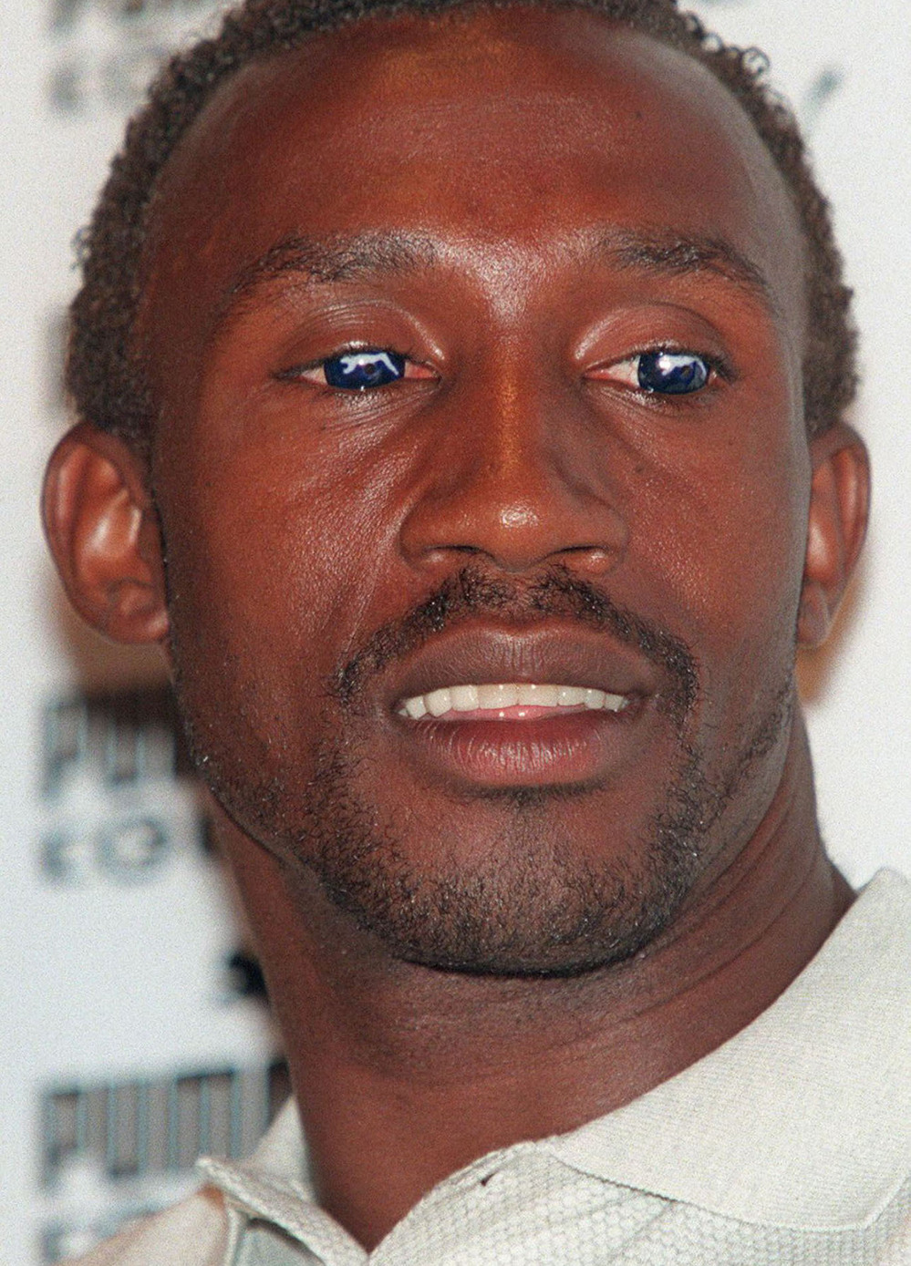 British sprinter Linford Christie skirted Olympic ad regulations by wearing Puma logo contact lenses to an Atlanta Olympics news conference in 1996.