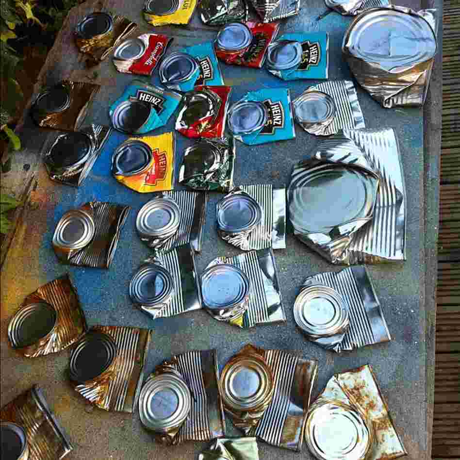 Collection of can bodies, awaiting face painting.