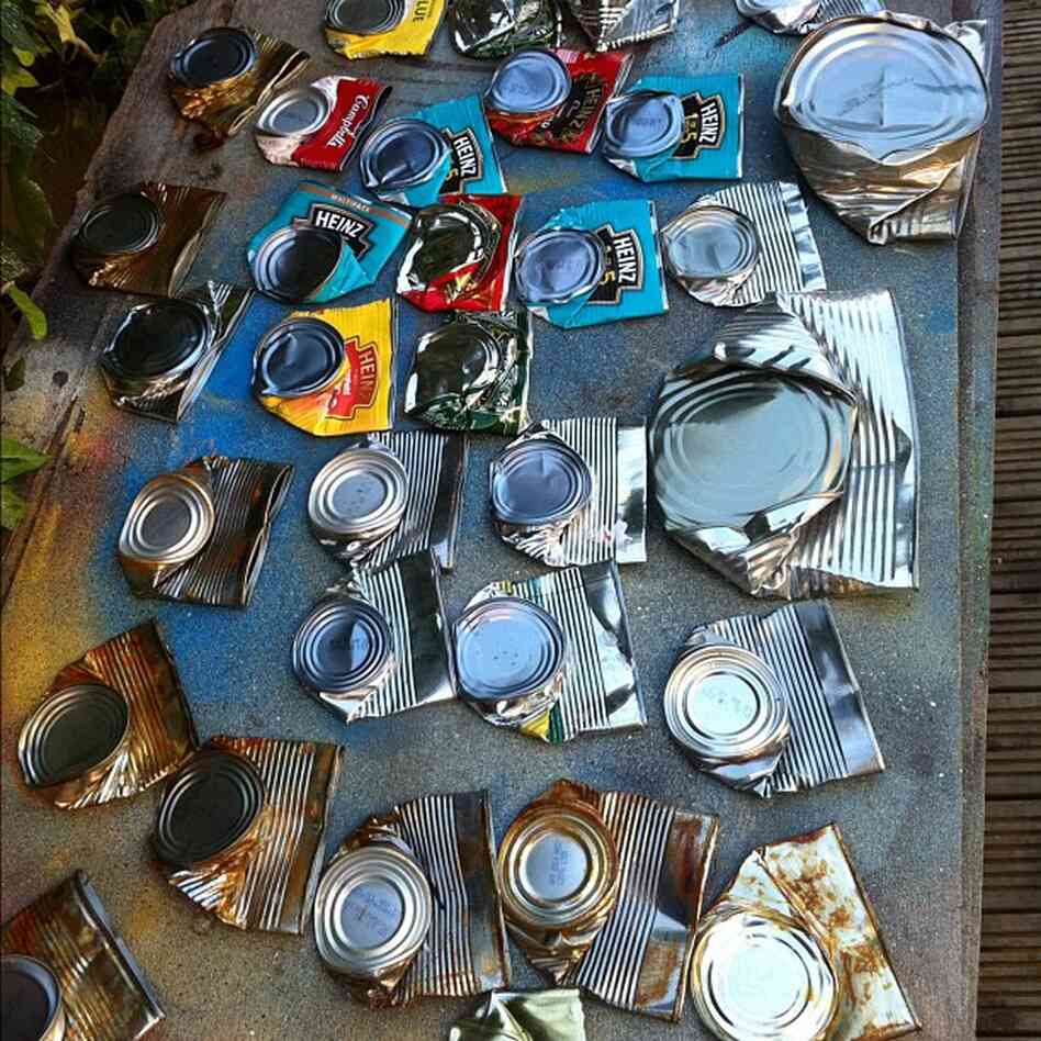 Collection of can bodies, awaiting face painting.
