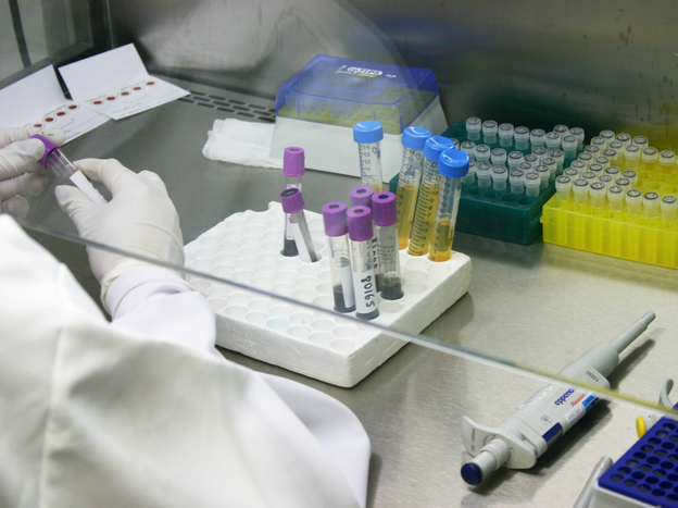 Researchers with HIV medication at a public research lab at the Oswaldo Cruz Foundation, or Fiocruz, in Rio de Janeiro.