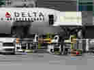 A Delta Air Lines jet being serviced last year by Gate Gourmet caterers in San Francisco. A Delta Air Lines jet being serviced last year by Gate Gourmet caterers in San Francisco.